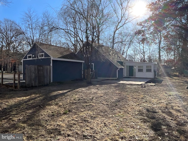 back of house featuring a patio area