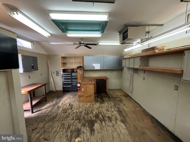 basement featuring dark hardwood / wood-style flooring