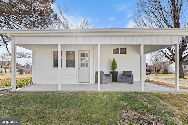 exterior space featuring a yard and a patio