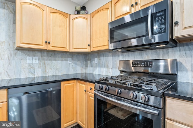 kitchen featuring tasteful backsplash, gas range, dishwasher, and light brown cabinets