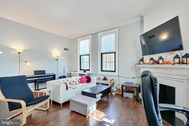 living room featuring crown molding and dark hardwood / wood-style floors