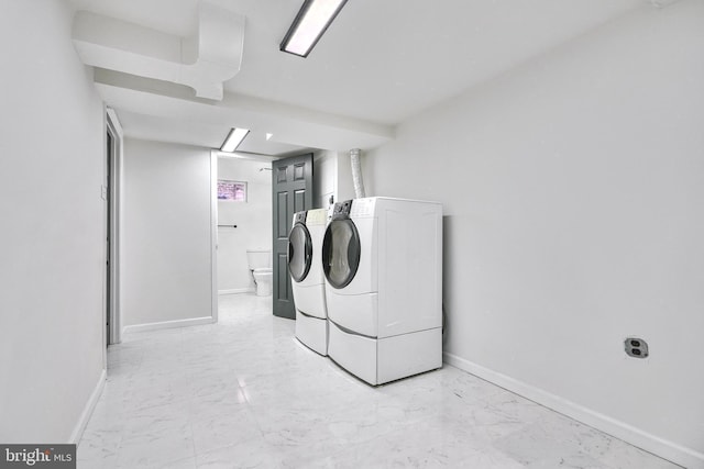 laundry area featuring separate washer and dryer