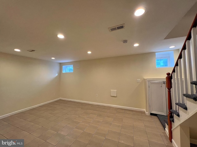 basement with light tile patterned floors