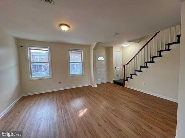 entrance foyer featuring hardwood / wood-style floors