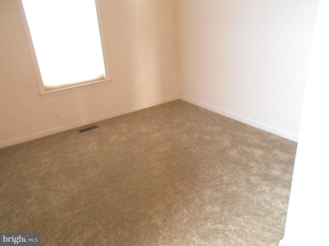 empty room with carpet floors