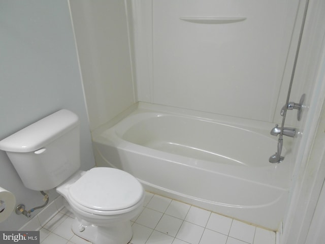 bathroom featuring shower / bathtub combination, tile patterned floors, and toilet