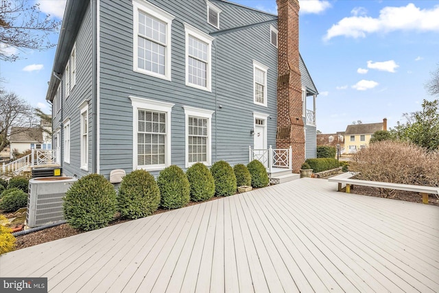 wooden terrace with central AC unit