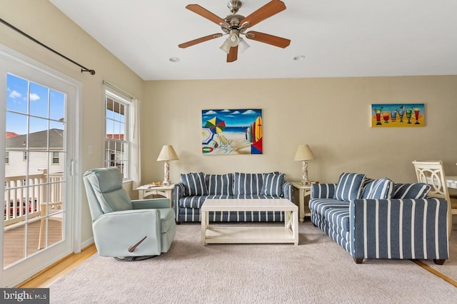 living room featuring ceiling fan