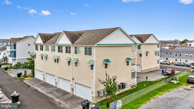 view of property with central AC unit