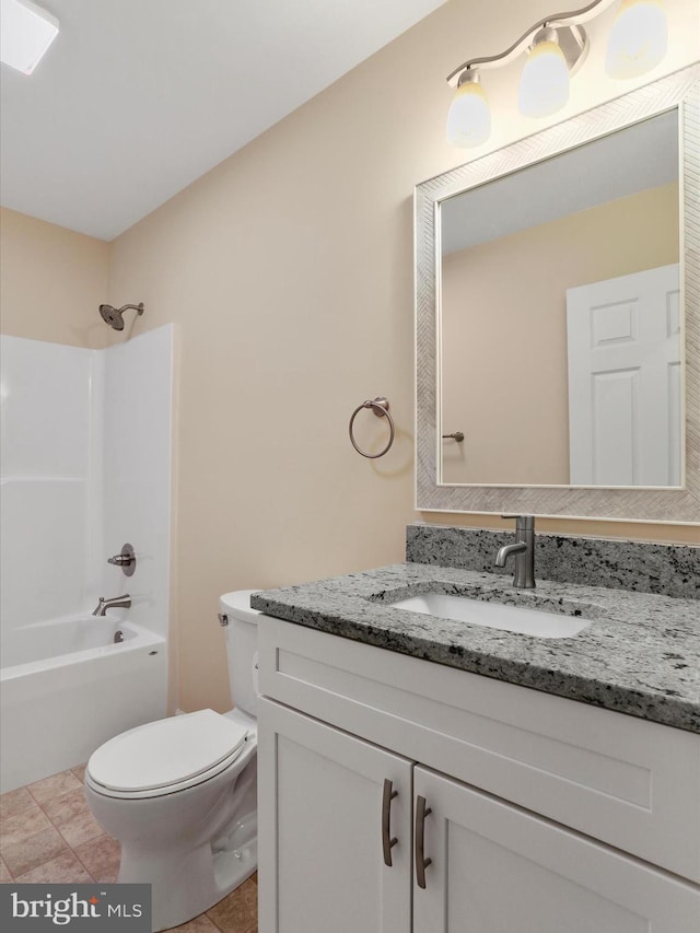 full bathroom featuring vanity, toilet, and bathing tub / shower combination