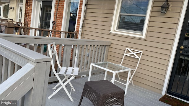 wooden balcony with a wooden deck