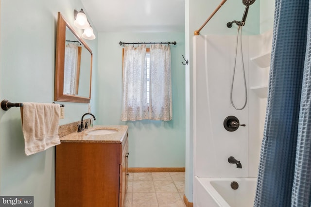 full bathroom with baseboards, tile patterned floors, vanity, and shower / tub combo with curtain