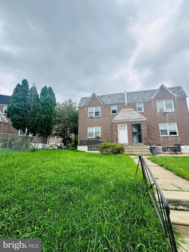 view of front of house with a front yard