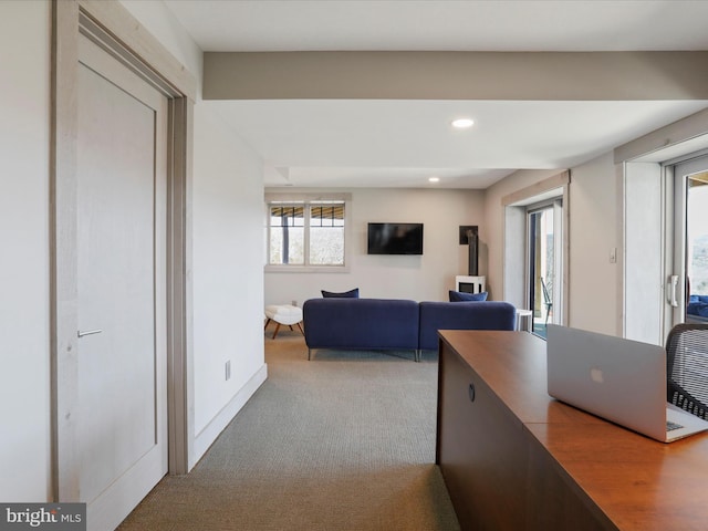 interior space with carpet, baseboards, and recessed lighting