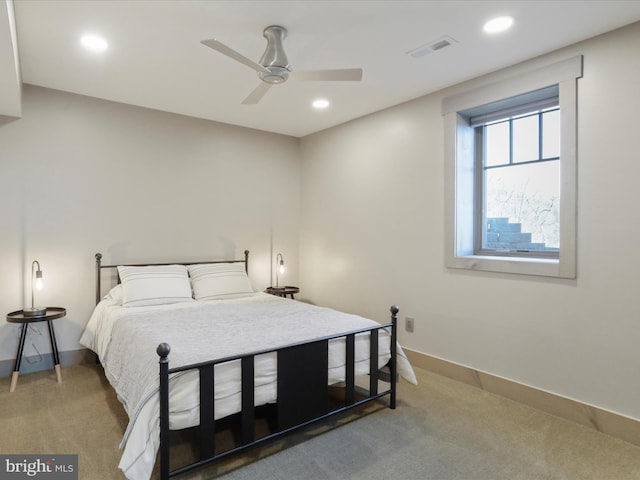 bedroom with light carpet, baseboards, visible vents, and recessed lighting