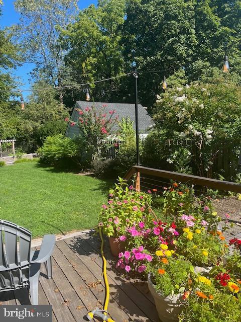 view of yard featuring a wooden deck