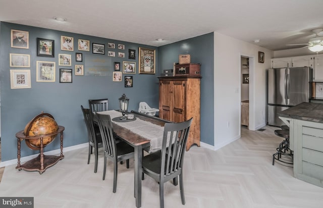 dining area with ceiling fan