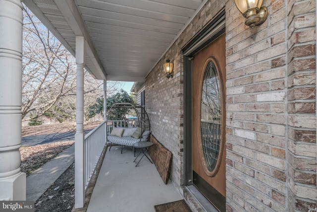 doorway to property with a porch