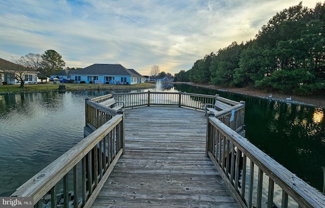 view of dock featuring a water view