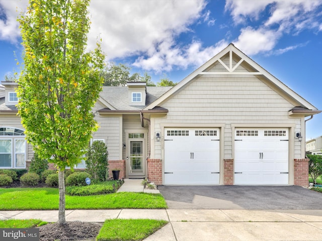 craftsman-style house featuring a garage