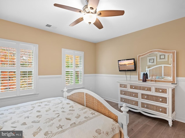 bedroom featuring ceiling fan and wood-type flooring