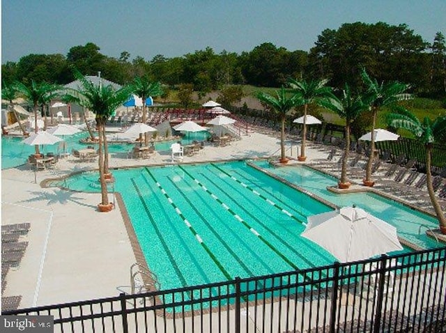 view of pool featuring a patio area