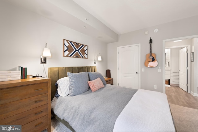 bedroom with wood-type flooring