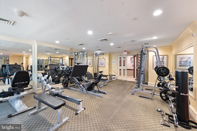 exercise room with ornamental molding