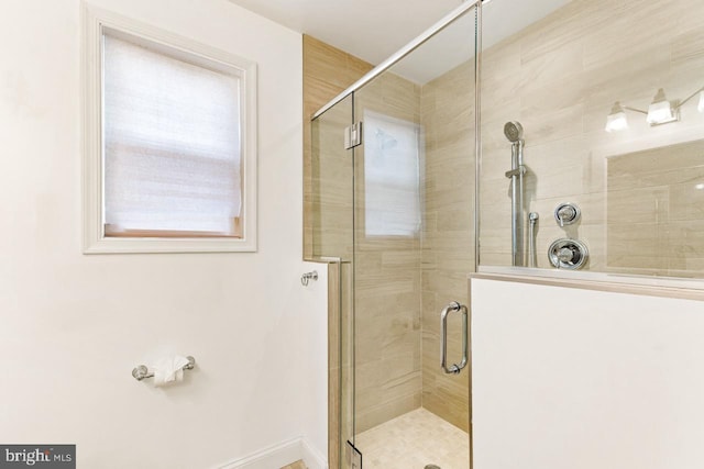 bathroom with an enclosed shower