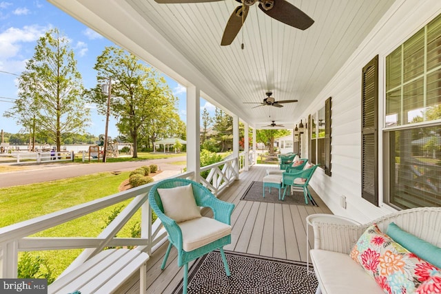 deck featuring ceiling fan and covered porch