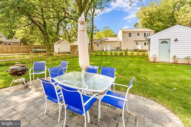 view of patio featuring a storage shed