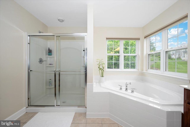 11050 Sanandrew Dr, New Market, MD 21774 - bathroom with tile patterned flooring, a shower stall, a garden tub, and vanity