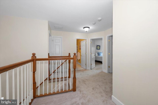 11050 Sanandrew Dr, New Market, MD 21774 - hallway featuring an upstairs landing, carpet floors, and baseboards