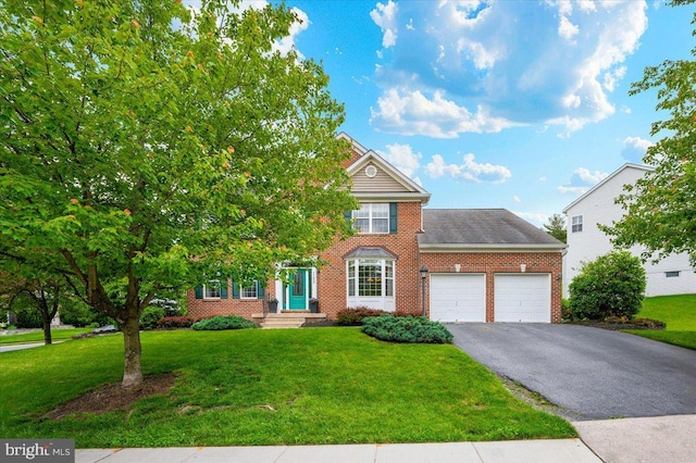 11050 Sanandrew Dr, New Market, MD 21774 - view of front of house featuring brick siding, a garage, driveway, and a front yard