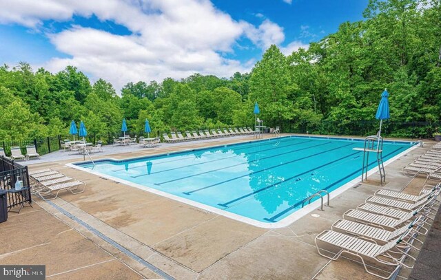 11050 Sanandrew Dr, New Market, MD 21774 - community pool featuring a patio area