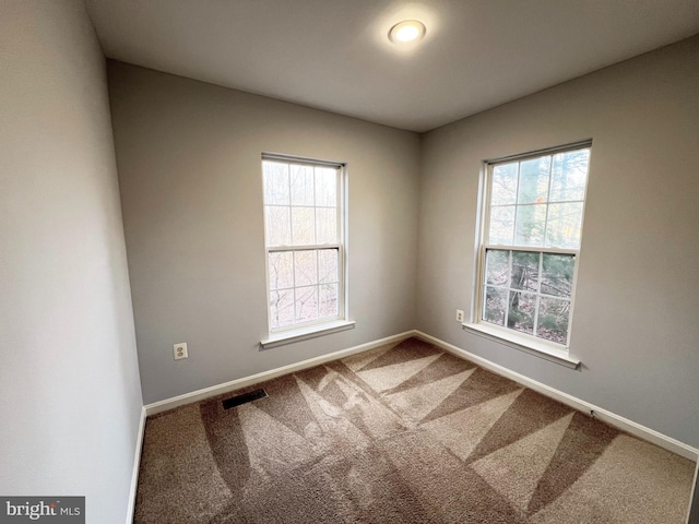 view of carpeted spare room