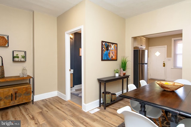 dining room featuring light wood-type flooring