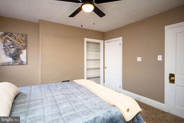 bedroom with ceiling fan and carpet flooring