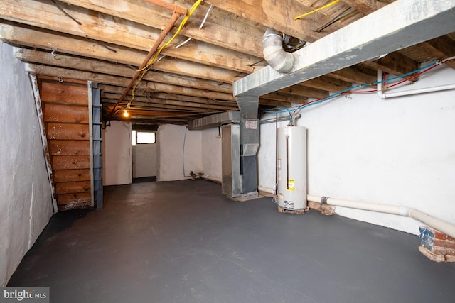 basement featuring heating unit and gas water heater