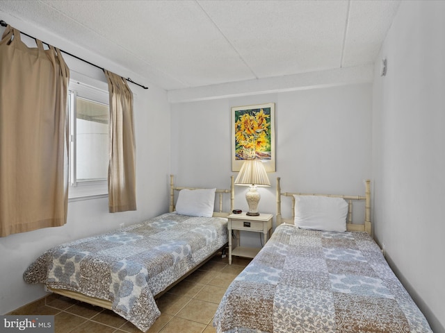 bedroom with tile patterned flooring