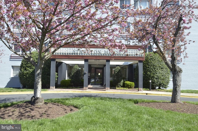 view of community with a lawn