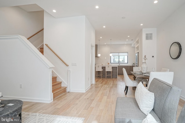 living room with light wood-type flooring