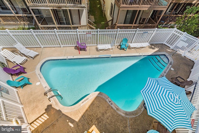 view of pool with a patio area