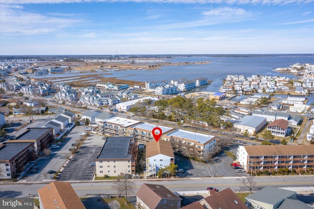 birds eye view of property featuring a water view