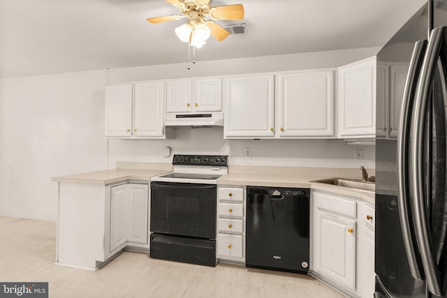 kitchen featuring sink, light hardwood / wood-style flooring, ceiling fan, black appliances, and white cabinets