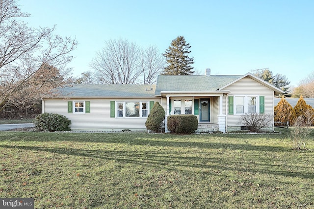 single story home featuring a front yard and covered porch