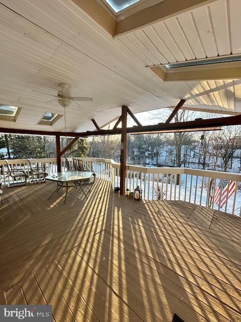 view of dock featuring a wooden deck