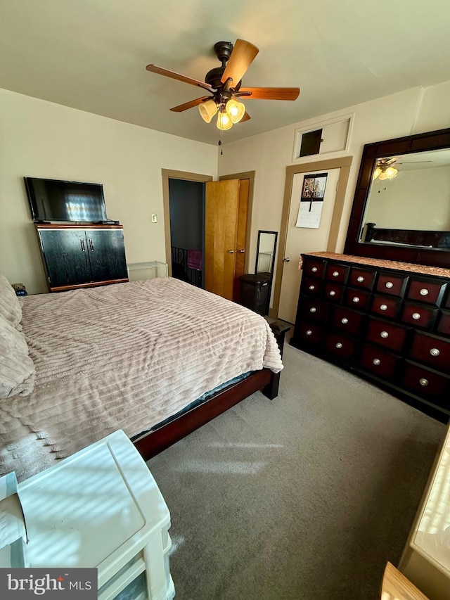 carpeted bedroom with ceiling fan