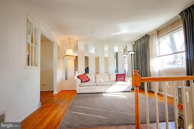 living area with wood finished floors