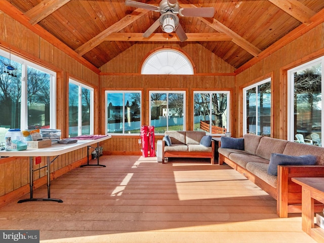 sunroom with wood ceiling, lofted ceiling with beams, and ceiling fan